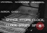 Image of spider in clock Akron Ohio USA, 1932, second 3 stock footage video 65675070961
