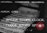 Image of spider in clock Akron Ohio USA, 1932, second 4 stock footage video 65675070961