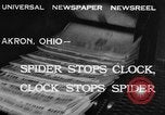 Image of spider in clock Akron Ohio USA, 1932, second 6 stock footage video 65675070961