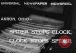Image of spider in clock Akron Ohio USA, 1932, second 7 stock footage video 65675070961