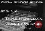 Image of spider in clock Akron Ohio USA, 1932, second 9 stock footage video 65675070961