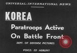 Image of American paratroopers jump from airplanes in Korean War Korea, 1952, second 13 stock footage video 65675070966