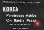 Image of American paratroopers jump from airplanes in Korean War Korea, 1952, second 14 stock footage video 65675070966