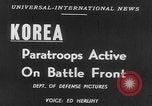Image of American paratroopers jump from airplanes in Korean War Korea, 1952, second 16 stock footage video 65675070966