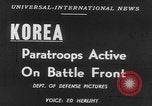 Image of American paratroopers jump from airplanes in Korean War Korea, 1952, second 17 stock footage video 65675070966