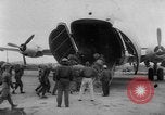Image of American paratroopers jump from airplanes in Korean War Korea, 1952, second 24 stock footage video 65675070966
