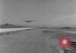 Image of American paratroopers jump from airplanes in Korean War Korea, 1952, second 29 stock footage video 65675070966
