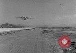 Image of American paratroopers jump from airplanes in Korean War Korea, 1952, second 30 stock footage video 65675070966