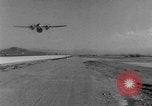 Image of American paratroopers jump from airplanes in Korean War Korea, 1952, second 31 stock footage video 65675070966