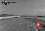 Image of American paratroopers jump from airplanes in Korean War Korea, 1952, second 32 stock footage video 65675070966