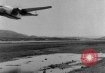 Image of American paratroopers jump from airplanes in Korean War Korea, 1952, second 34 stock footage video 65675070966