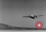 Image of American paratroopers jump from airplanes in Korean War Korea, 1952, second 35 stock footage video 65675070966