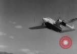Image of American paratroopers jump from airplanes in Korean War Korea, 1952, second 36 stock footage video 65675070966