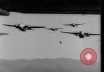 Image of American paratroopers jump from airplanes in Korean War Korea, 1952, second 38 stock footage video 65675070966