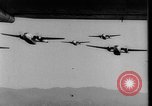 Image of American paratroopers jump from airplanes in Korean War Korea, 1952, second 39 stock footage video 65675070966
