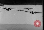 Image of American paratroopers jump from airplanes in Korean War Korea, 1952, second 40 stock footage video 65675070966