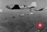 Image of American paratroopers jump from airplanes in Korean War Korea, 1952, second 47 stock footage video 65675070966