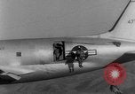 Image of American paratroopers jump from airplanes in Korean War Korea, 1952, second 49 stock footage video 65675070966