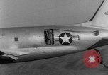 Image of American paratroopers jump from airplanes in Korean War Korea, 1952, second 50 stock footage video 65675070966