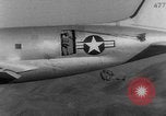 Image of American paratroopers jump from airplanes in Korean War Korea, 1952, second 52 stock footage video 65675070966