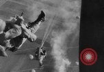 Image of American paratroopers jump from airplanes in Korean War Korea, 1952, second 58 stock footage video 65675070966