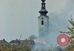 Standbild Gramastetten Österreich Kirche Markt Bereich in Brand Gramastetten Österreich, 1945, aus Sekunde 37 historischem Filmmaterial Videoclip 65675070987
