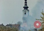 Standbild Gramastetten Österreich Kirche Markt Bereich in Brand Gramastetten Österreich, 1945, aus Sekunde 41 historischem Filmmaterial Videoclip 65675070987