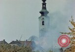 Standbild Gramastetten Österreich Kirche Markt Bereich in Brand Gramastetten Österreich, 1945, aus Sekunde 44 historischem Filmmaterial Videoclip 65675070987