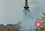 Standbild Gramastetten Österreich Kirche Markt Bereich in Brand Gramastetten Österreich, 1945, aus Sekunde 46 historischem Filmmaterial Videoclip 65675070987