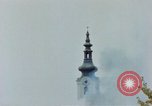 Standbild Gramastetten Österreich Kirche Markt Bereich in Brand Gramastetten Österreich, 1945, aus Sekunde 52 historischem Filmmaterial Videoclip 65675070987