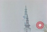 Standbild Gramastetten Österreich Kirche Markt Bereich in Brand Gramastetten Österreich, 1945, aus Sekunde 56 historischem Filmmaterial Videoclip 65675070987