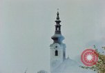 Standbild Gramastetten Österreich Kirche Markt Bereich in Brand Gramastetten Österreich, 1945, aus Sekunde 57 historischem Filmmaterial Videoclip 65675070987
