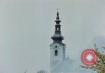 Standbild Gramastetten Österreich Kirche Markt Bereich in Brand Gramastetten Österreich, 1945, aus Sekunde 58 historischem Filmmaterial Videoclip 65675070987