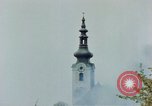 Standbild Gramastetten Österreich Kirche Markt Bereich in Brand Gramastetten Österreich, 1945, aus Sekunde 59 historischem Filmmaterial Videoclip 65675070987