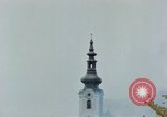 Standbild Gramastetten Österreich Kirche Markt Bereich in Brand Gramastetten Österreich, 1945, aus Sekunde 61 historischem Filmmaterial Videoclip 65675070987