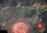 Image of air strikes on road intersection Vietnam, 1967, second 5 stock footage video 65675071012