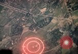 Image of air strikes on road intersection Vietnam, 1967, second 9 stock footage video 65675071012