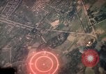 Image of air strikes on road intersection Vietnam, 1967, second 10 stock footage video 65675071012