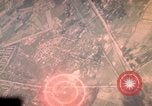 Image of air strikes on road intersection Vietnam, 1967, second 13 stock footage video 65675071012