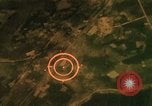 Image of air strikes on road intersection Vietnam, 1967, second 16 stock footage video 65675071012