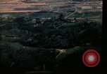 Image of air strikes on road intersection Vietnam, 1967, second 25 stock footage video 65675071012