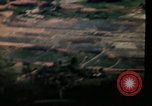 Image of air strikes on road intersection Vietnam, 1967, second 32 stock footage video 65675071012