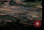 Image of air strikes on road intersection Vietnam, 1967, second 34 stock footage video 65675071012
