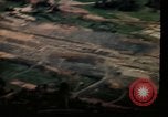 Image of air strikes on road intersection Vietnam, 1967, second 35 stock footage video 65675071012