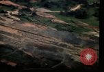Image of air strikes on road intersection Vietnam, 1967, second 36 stock footage video 65675071012