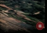 Image of air strikes on road intersection Vietnam, 1967, second 38 stock footage video 65675071012