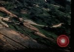 Image of air strikes on road intersection Vietnam, 1967, second 39 stock footage video 65675071012