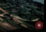 Image of air strikes on road intersection Vietnam, 1967, second 40 stock footage video 65675071012