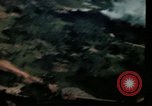 Image of air strikes on road intersection Vietnam, 1967, second 42 stock footage video 65675071012