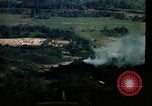 Image of air strikes on road intersection Vietnam, 1967, second 43 stock footage video 65675071012